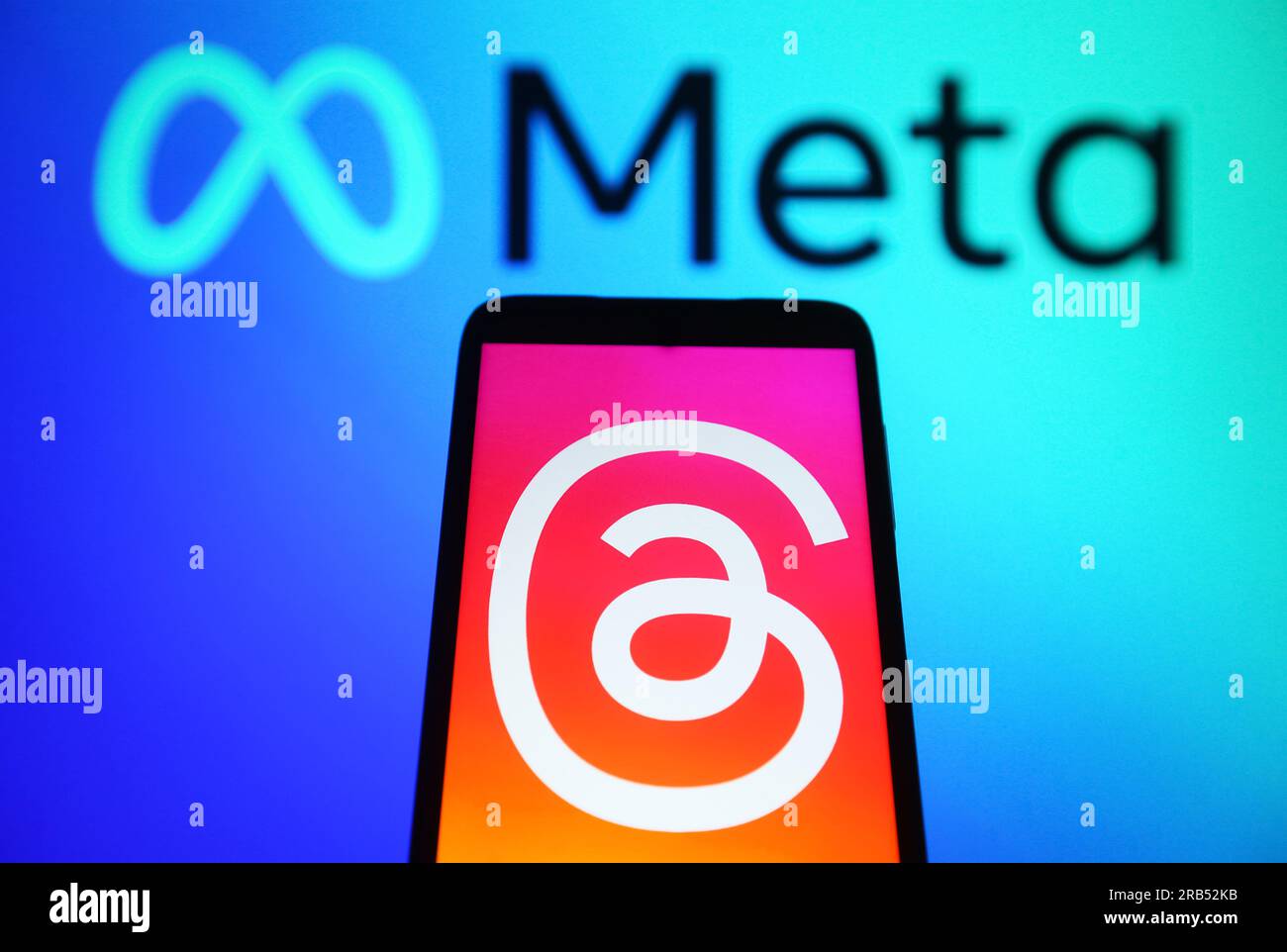 In this photo illustration, a Threads logo seen displayed on a ...