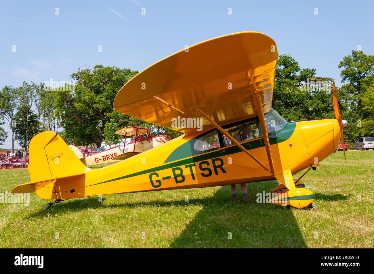 Aeronca 11 Chief plane on display at a wings and wheels event in the countryside at Heveningham Hall. Rural country in Suffolk. Fly-in event Stock Photo