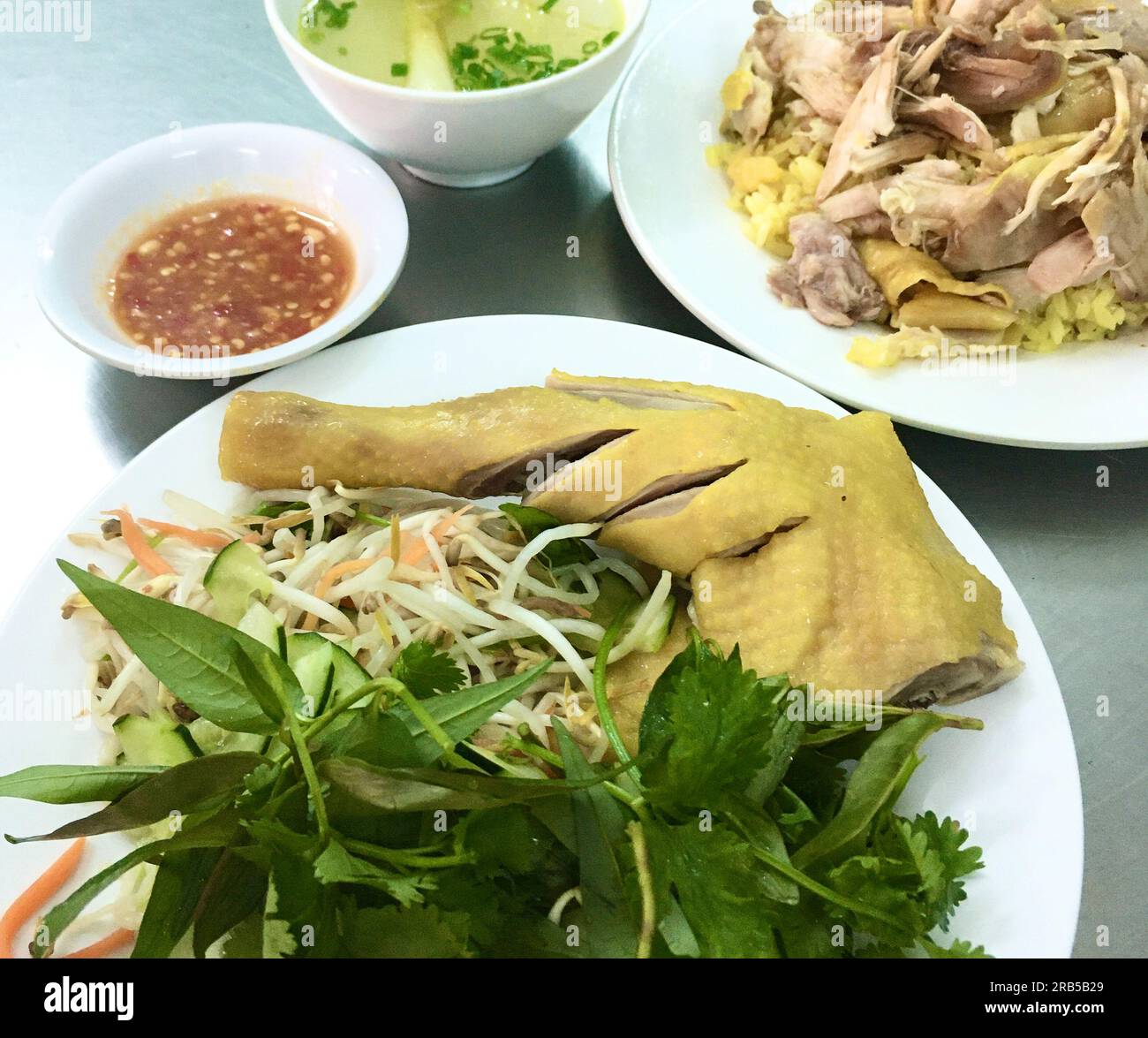 Chitken Rice is very famous food in Vietnam. The whole world knows this dish. Cơm gà Phú Yên, đặc sản Việt Nam. 越南旅游, वियतनाम पर्यटन, 베트남 관광, ベトナム観光 Stock Photo
