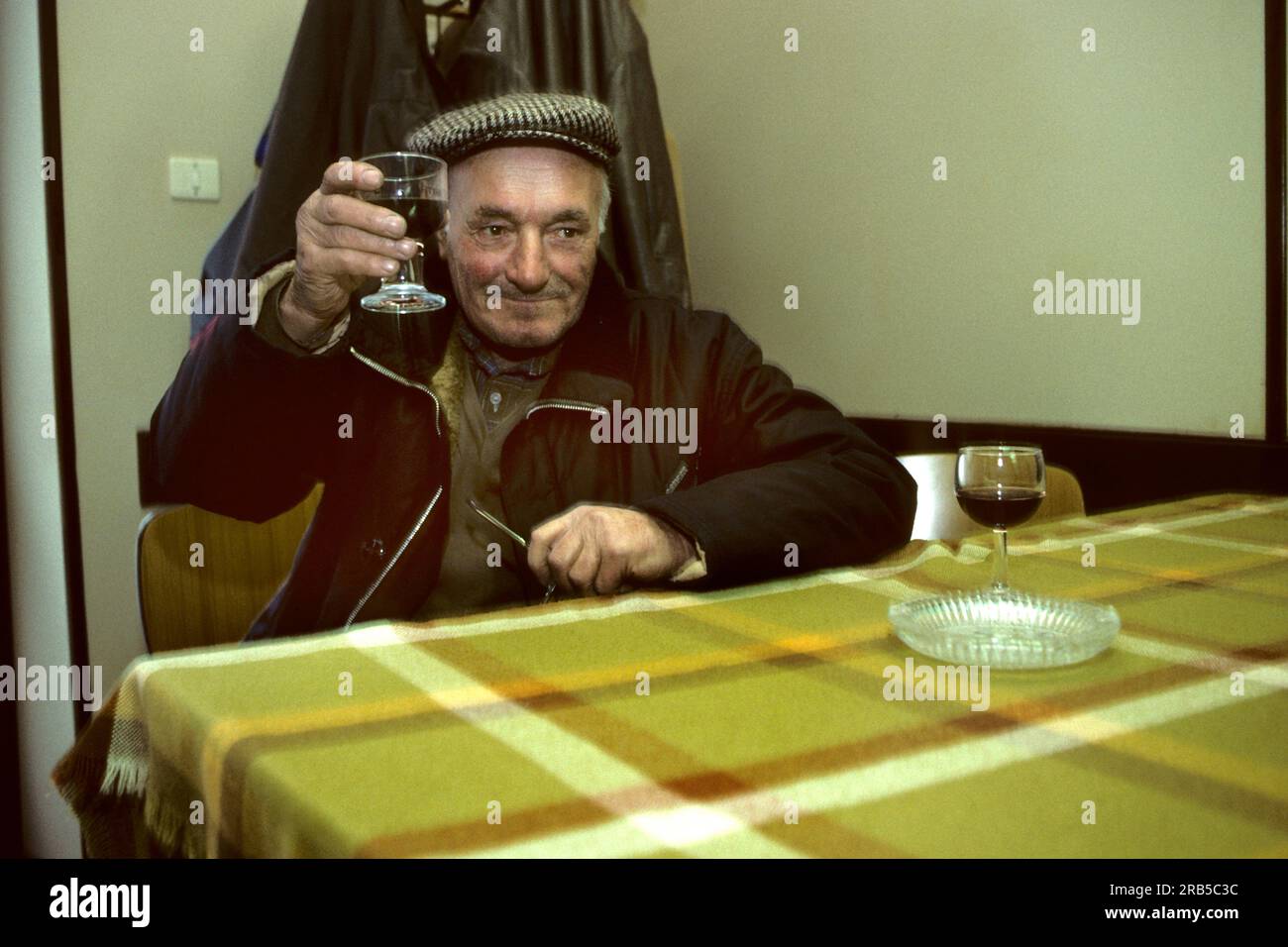 Elderly Man Drinking Red Wine Stock Photo
