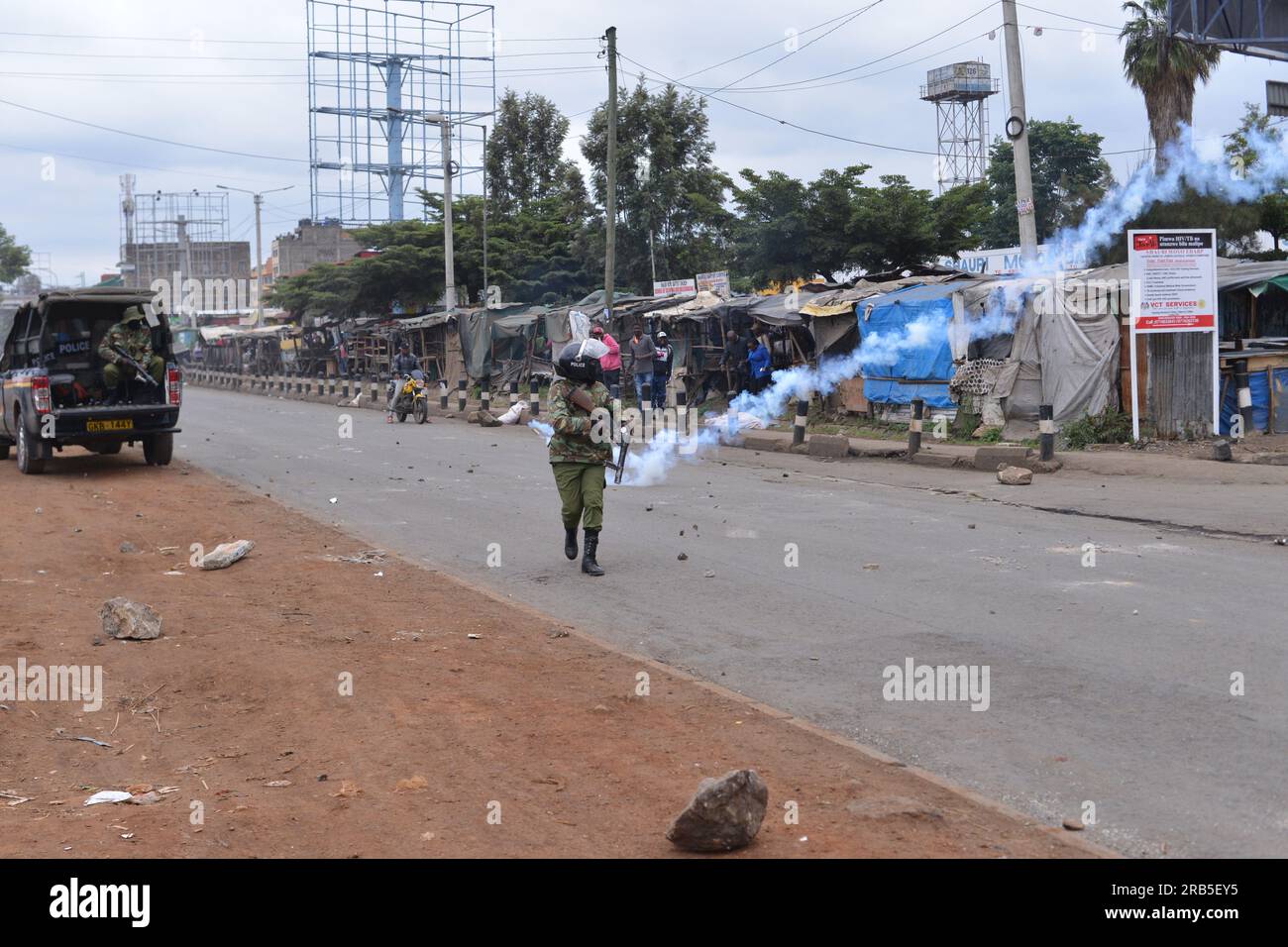 Nairobi, Kenya. 07th July, 2023. An anti-riot police runs after a protester who threw back a teargas canister fired towards them during an anti-government protest dubbed 'Saba Saba' along Jogoo Road in Nairobi. Credit: SOPA Images Limited/Alamy Live News Stock Photo