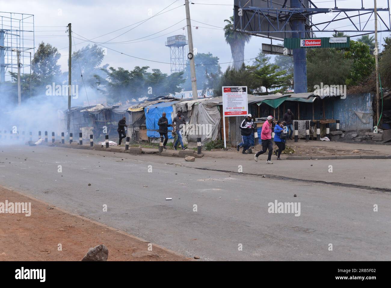 Nairobi, Kenya. 07th July, 2023. Members of the public run for safety after anti-riot police officers fired teargas canisters to disperse protesters during an anti-government protest dubbed 'Saba Saba' along Jogoo Road in Nairobi. Credit: SOPA Images Limited/Alamy Live News Stock Photo