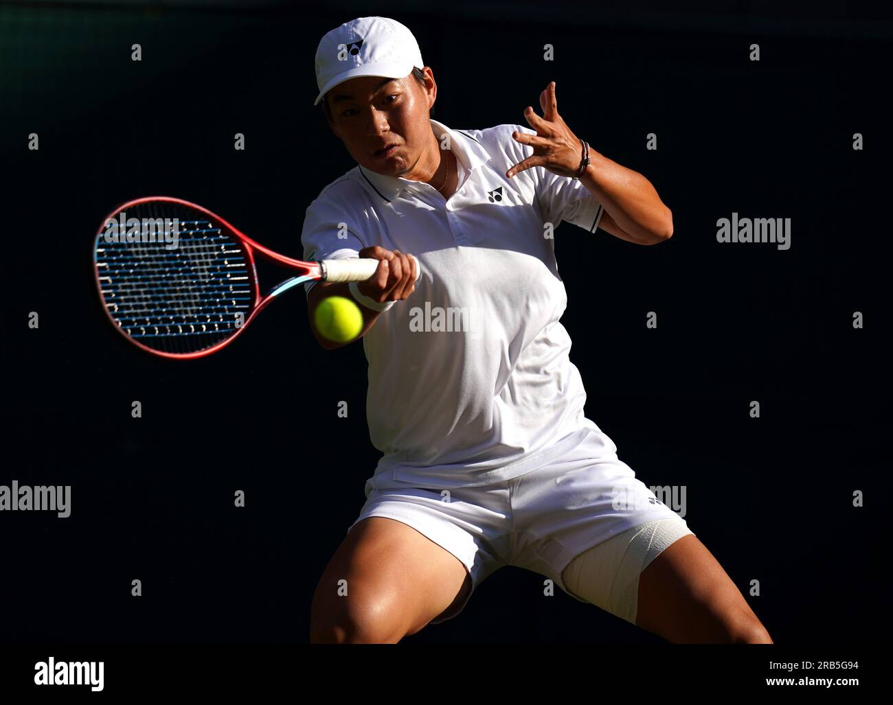 Zhuoxuan Bai in action against Ons Jabeur (not pictured) on day five of