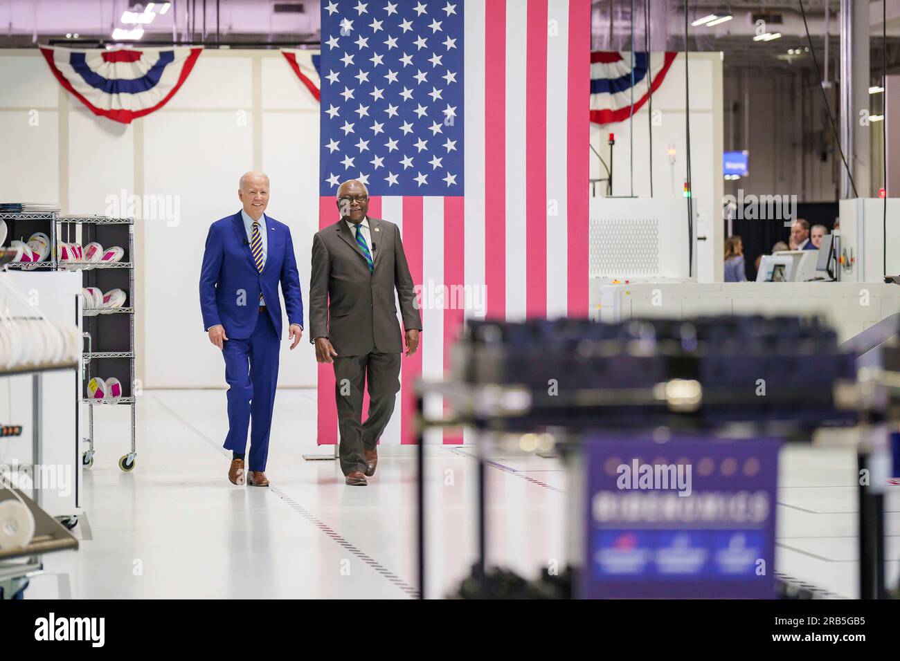 West Colombia, United States of America. 07 June, 2023. U.S President Joe Biden, left, and Rep. Jim Clyburn, D-S.C, arrive together for a tour of Flex LTDC, July 6, 2023 in West Colombia, South Carolina. Biden announced a new partnership with Enphase to bring 600 new jobs to South Carolina because of the Biden-Harris Administration build back America plan. Credit: Adam Schultz/White House Photo/Alamy Live News Stock Photo