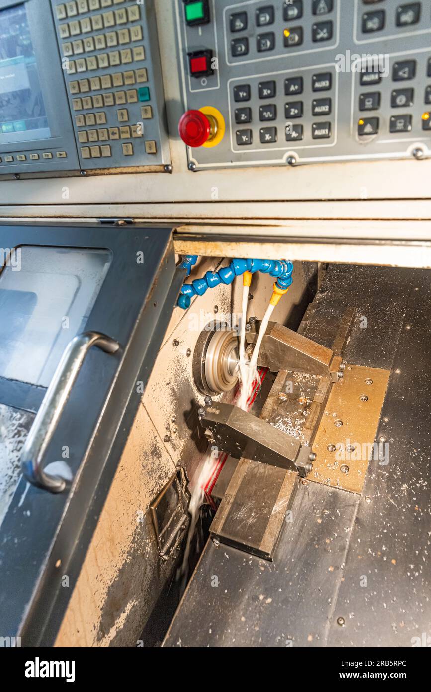 Milling metalworking process. Industrial CNC metalworking with vertical