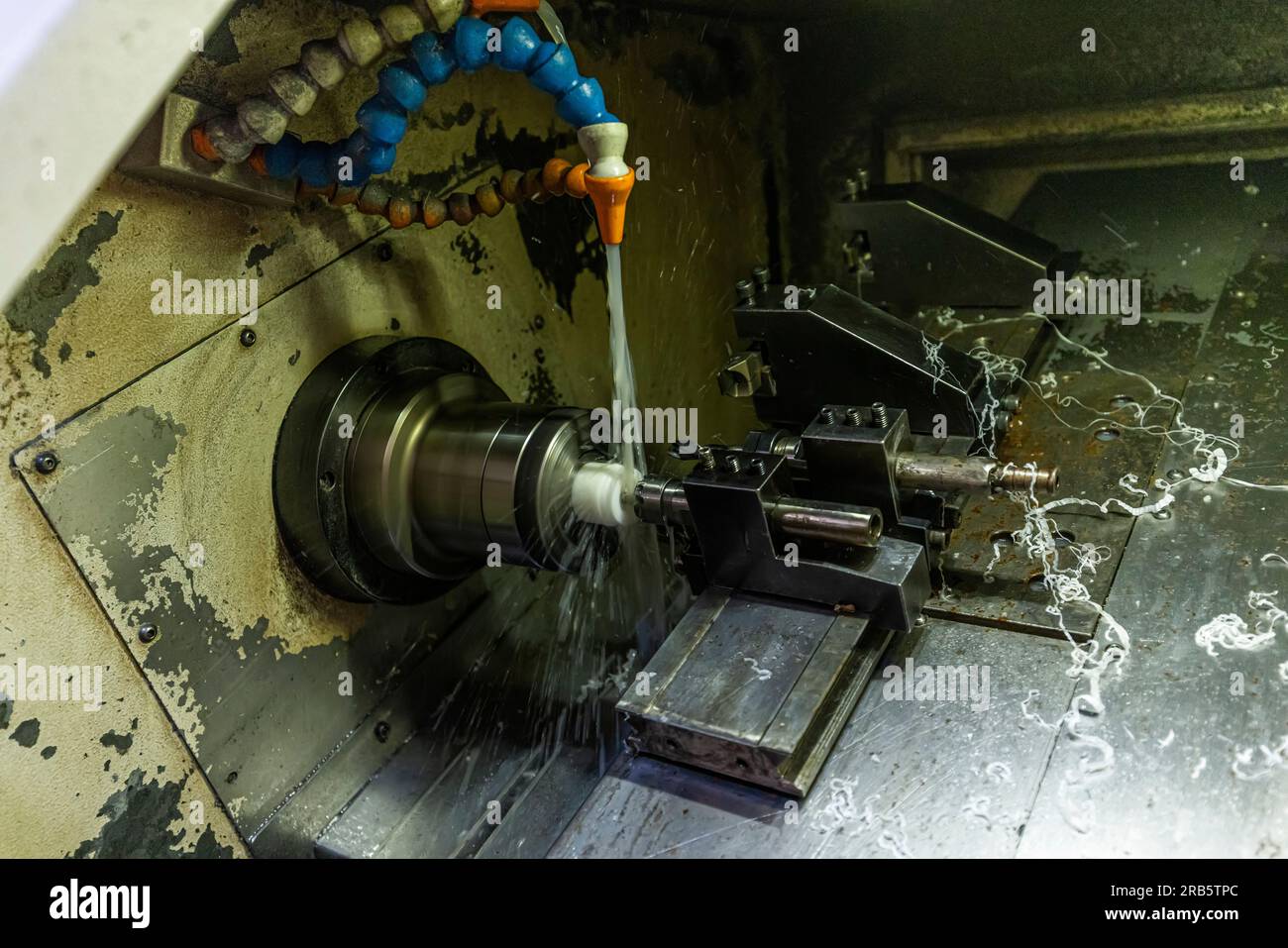 Milling metalworking process. Industrial CNC metalworking with vertical