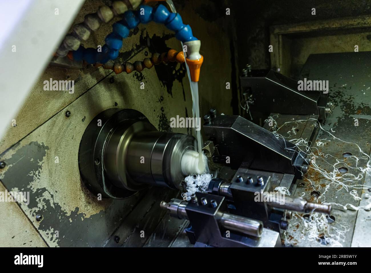 Milling metalworking process. Industrial CNC metalworking with vertical