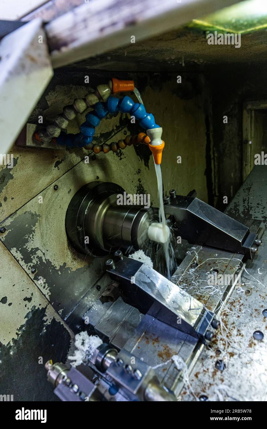 Milling metalworking process. Industrial CNC metalworking with vertical