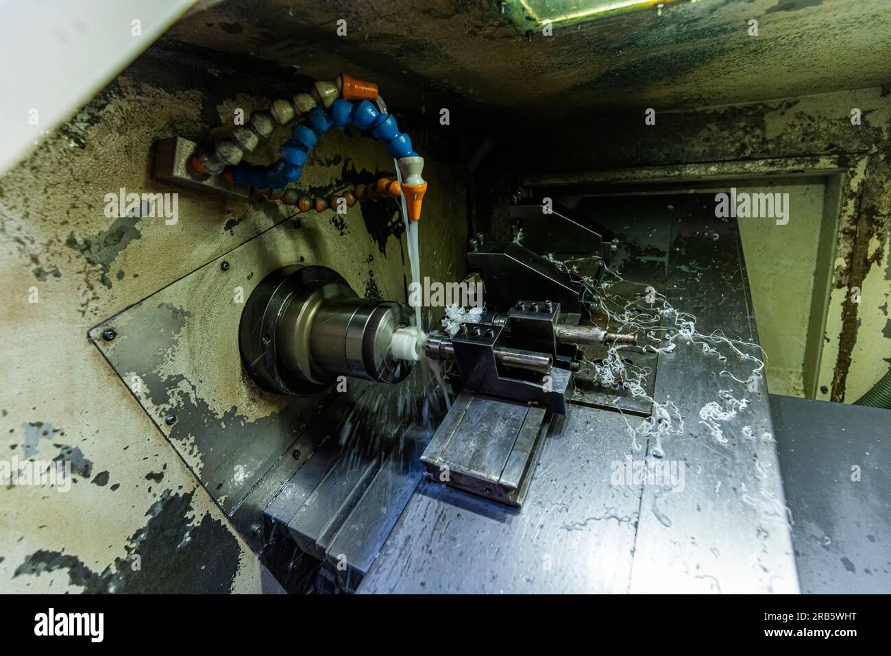 Milling metalworking process. Industrial CNC metalworking with vertical