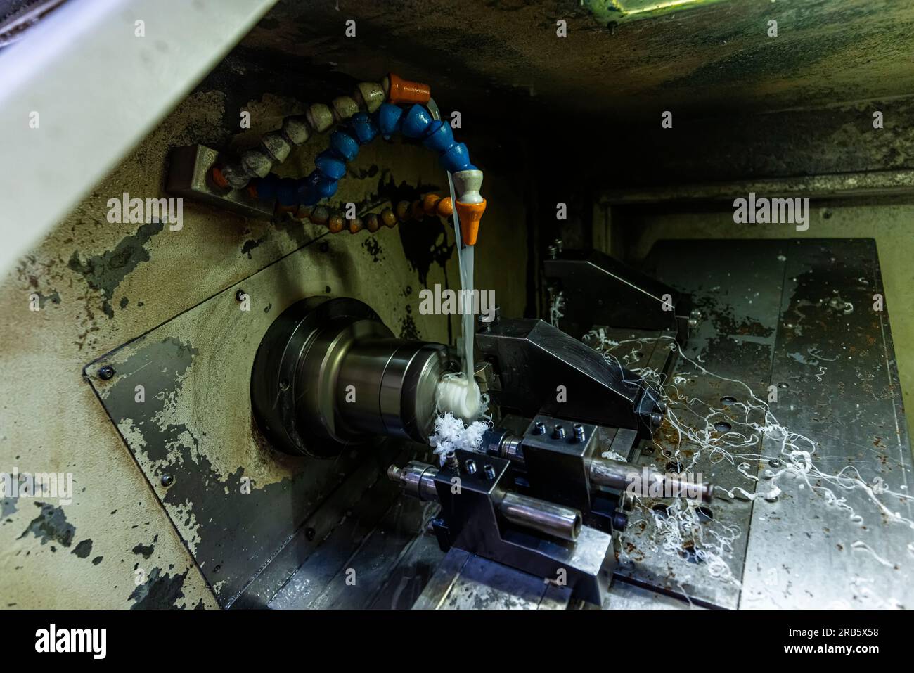 Milling metalworking process. Industrial CNC metalworking with vertical