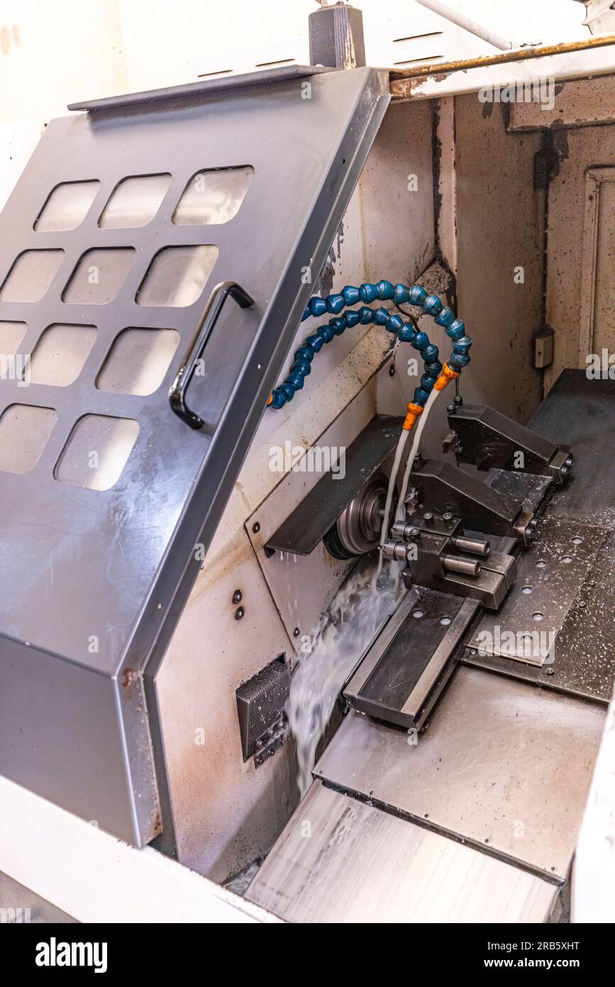 Milling metalworking process. Industrial CNC metalworking with vertical