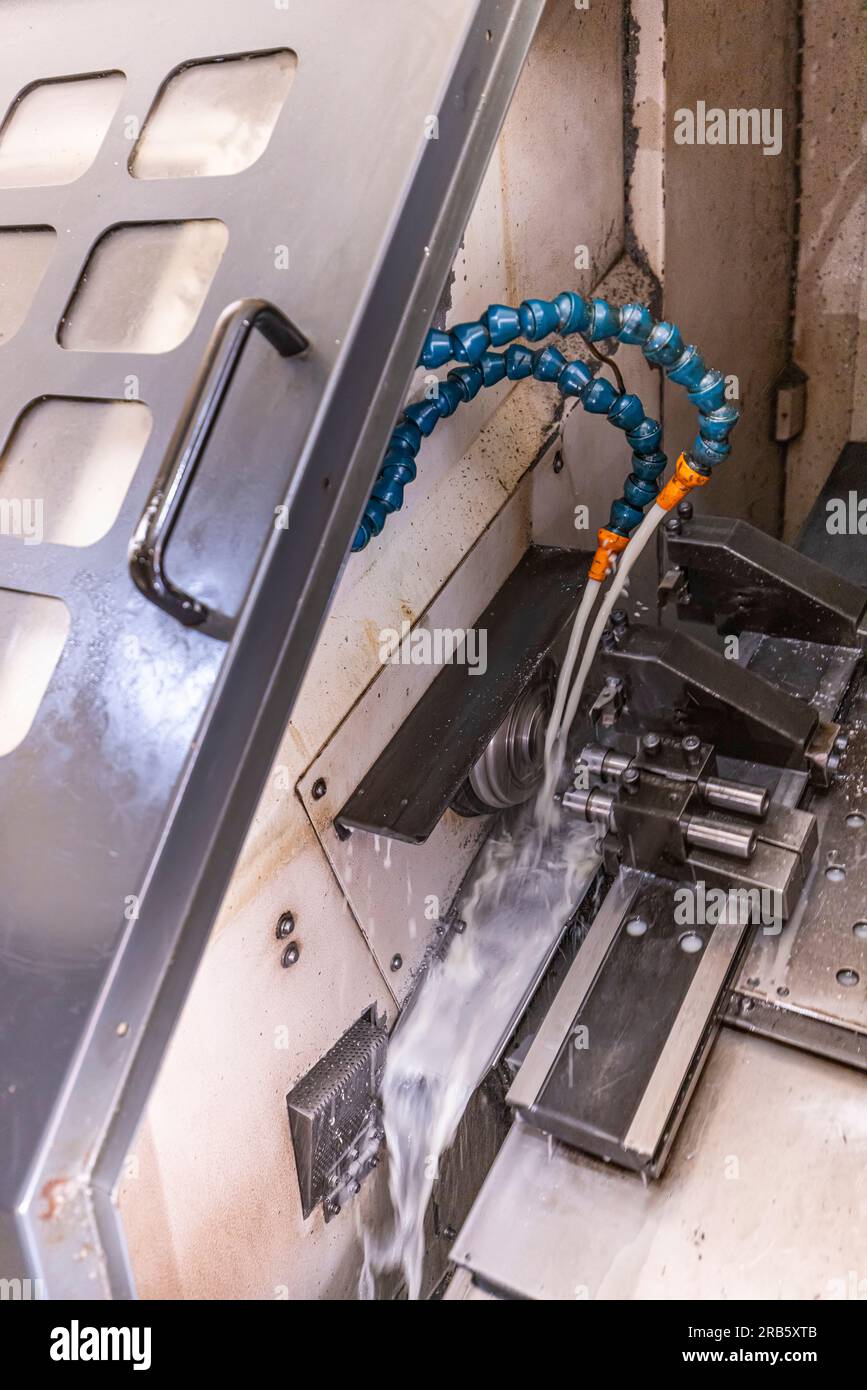 Milling metalworking process. Industrial CNC metalworking with vertical