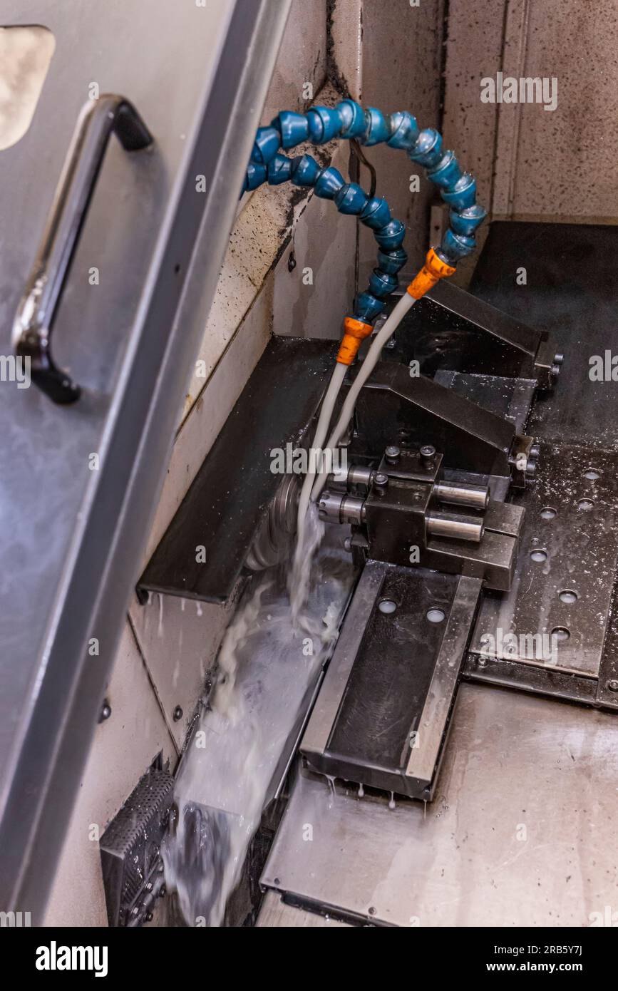 Milling metalworking process. Industrial CNC metalworking with vertical