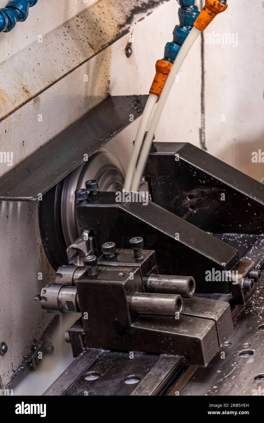 Milling metalworking process. Industrial CNC metalworking with vertical