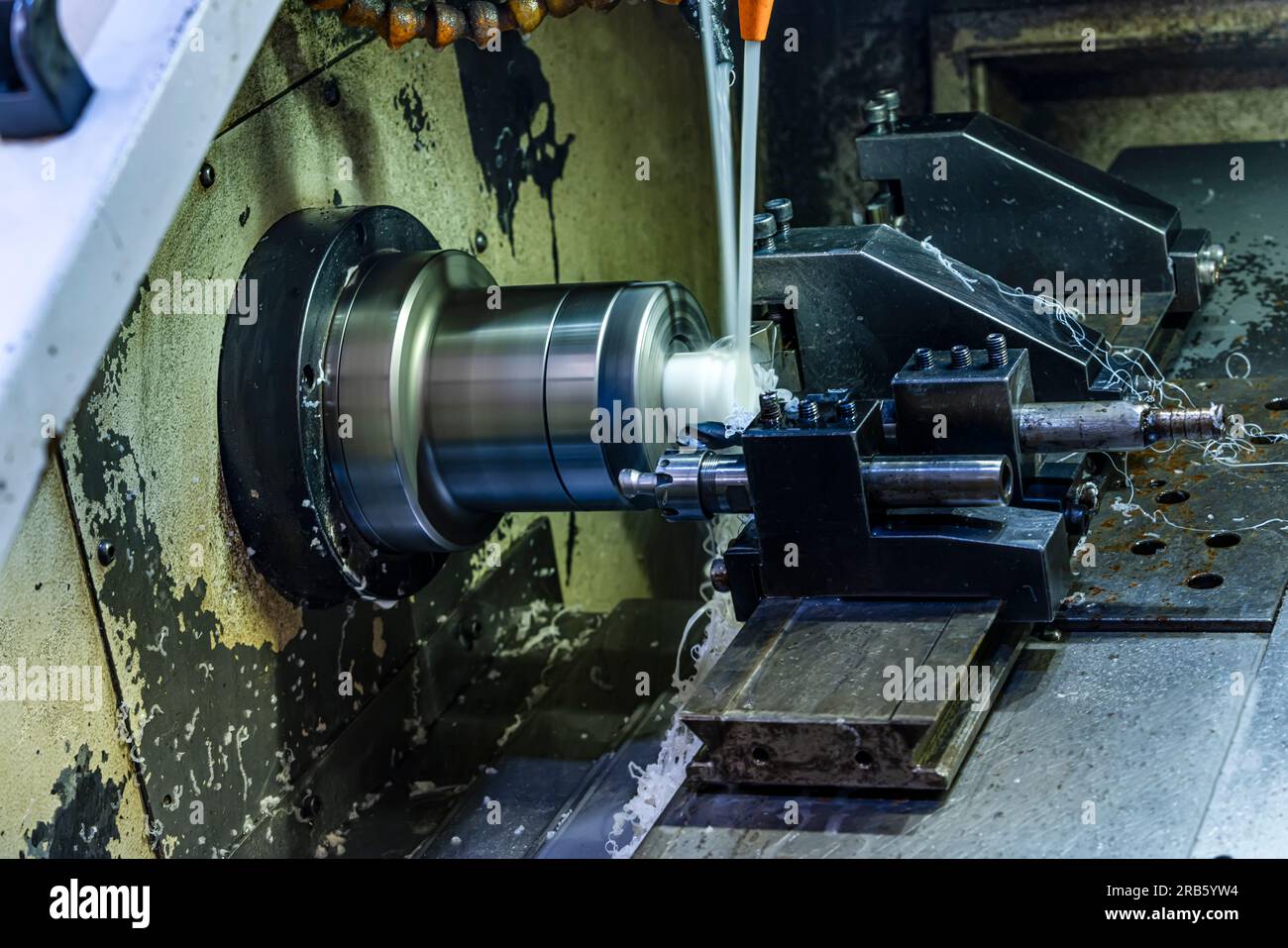 Milling metalworking process. Industrial CNC metalworking with vertical