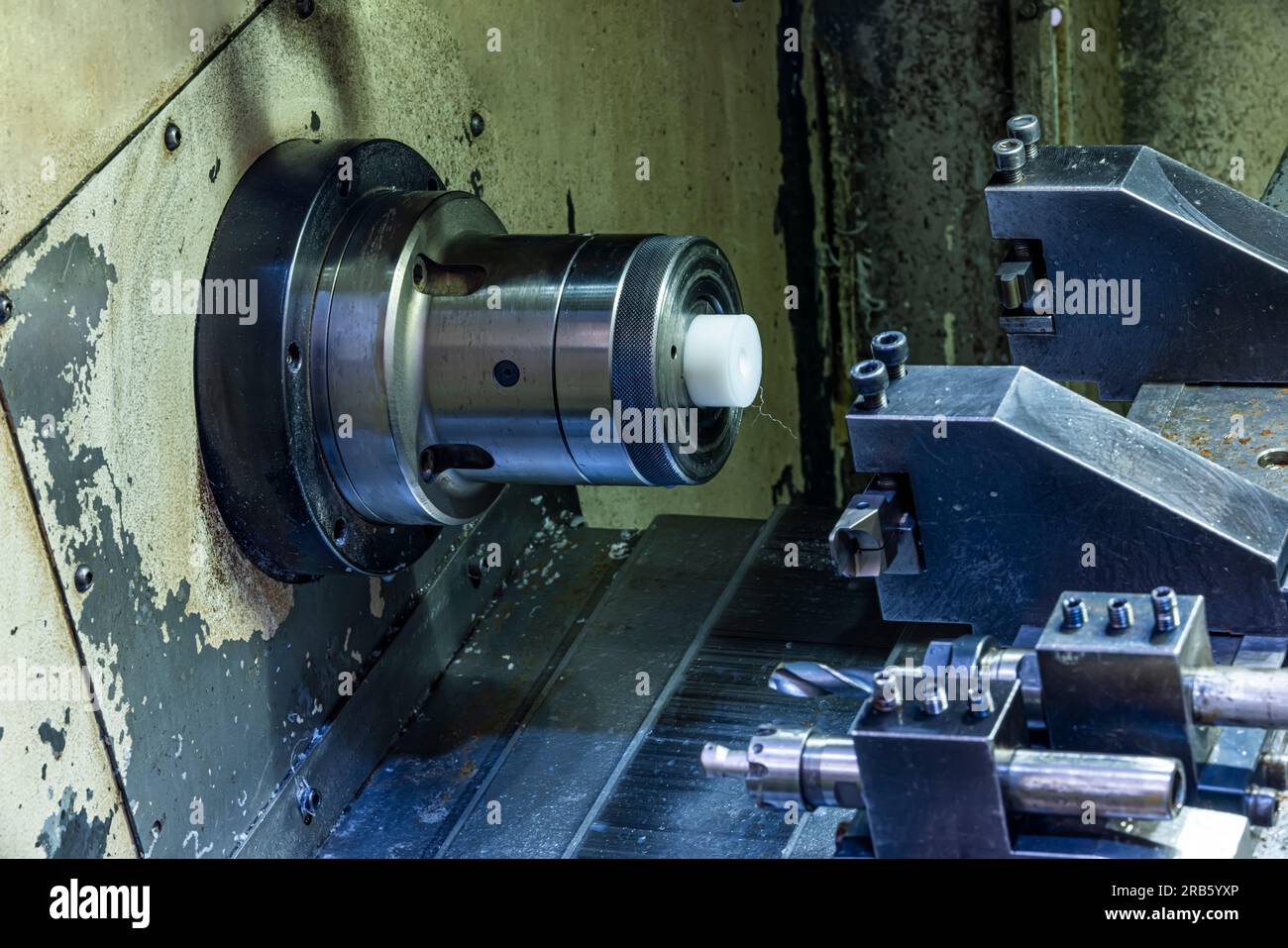 Milling metalworking process. Industrial CNC metalworking with vertical