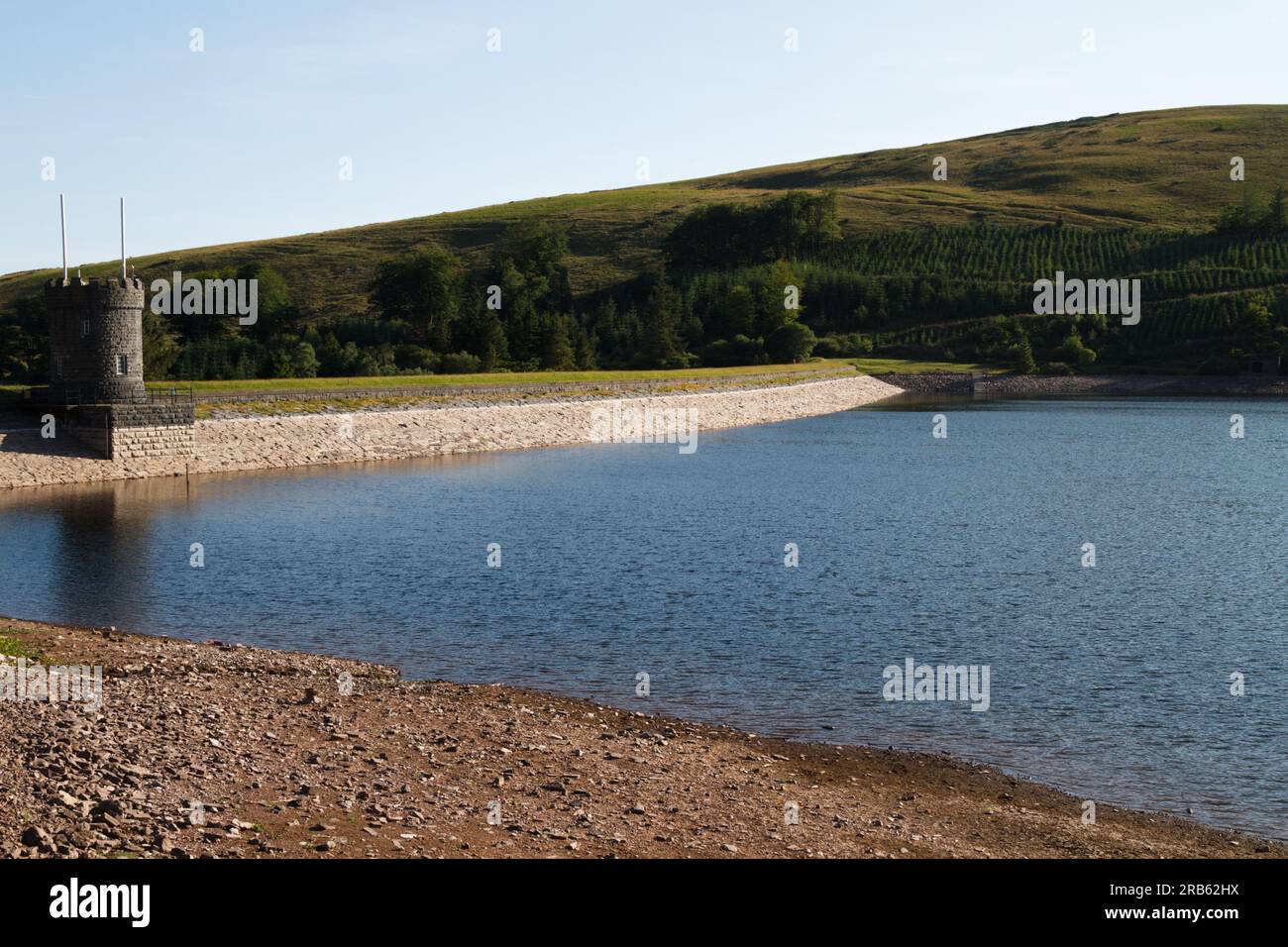 Beacons reservoir, Brecon Beacons, Powys, South Wales, UK. 7 July 2023.  Lower water levels than normal after weeks of warm weather.  Credit: Andrew Bartlett/Alamy Live News. Stock Photo