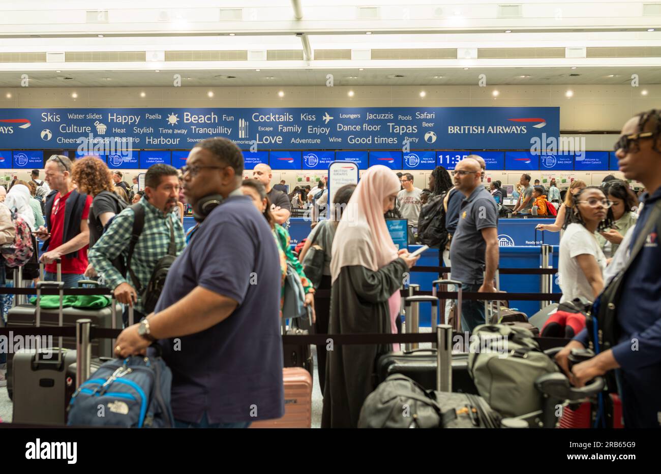 Gatwick Airport, London, UK, 7 Jul 2023. People queue to check in for flights at Gatwick Airport. Thousands of flights in Europe could be delayed or cancelled this summer as air traffic controllers  threaten to strike. Credit: Andy Soloman/Alamy Live News Stock Photo