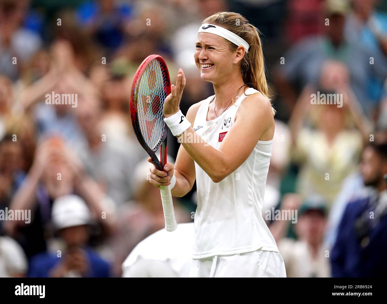 Marie Bouzkova celebrates victory following her match against Caroline