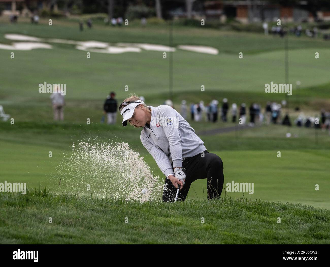 Pebble Beach, United States. 07th July, 2023. Brooke Henderson of Canada hits out of the sand to the 13th green in round two of the Women's U.S. Open in Pebble Beach, California on Friday, July 7, 2023. Photo by Terry Schmitt/UPI Credit: UPI/Alamy Live News Stock Photo