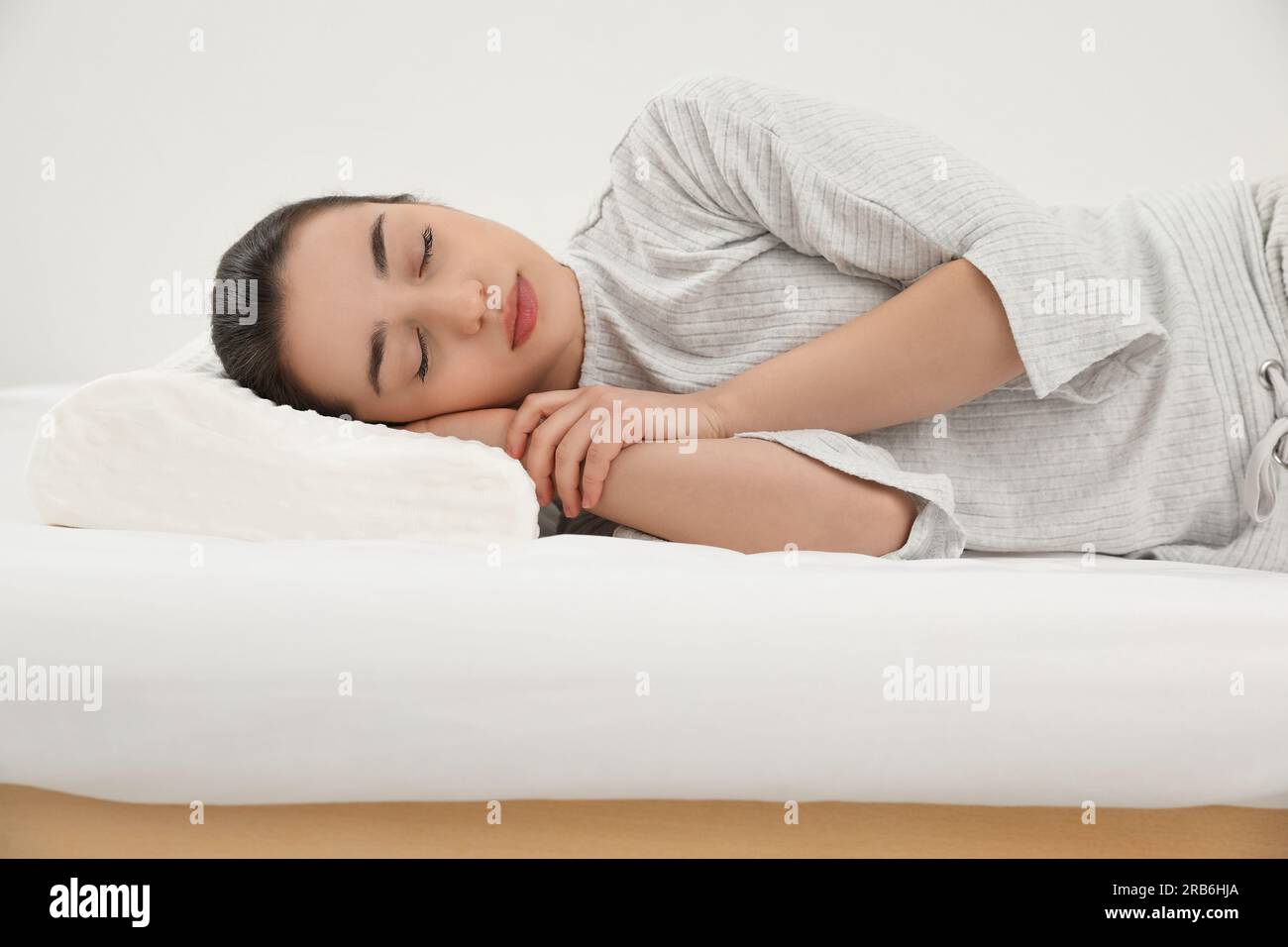 Woman sleeping on memory foam hi-res stock photography and images - Alamy