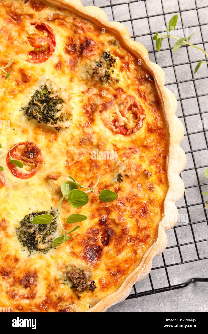 Delicious homemade quiche on table, top view Stock Photo