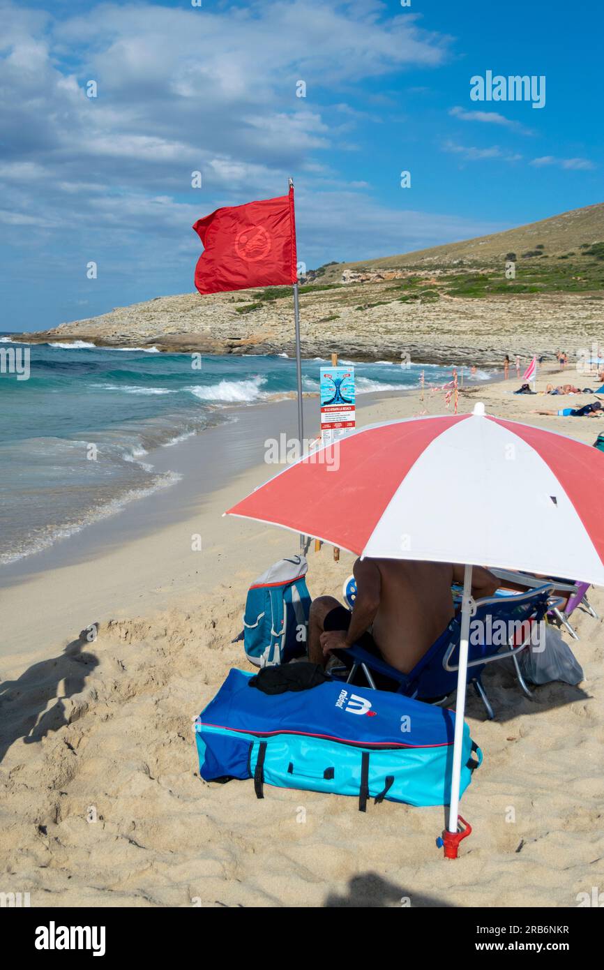 Rip currents flag on the beach Stock Photo