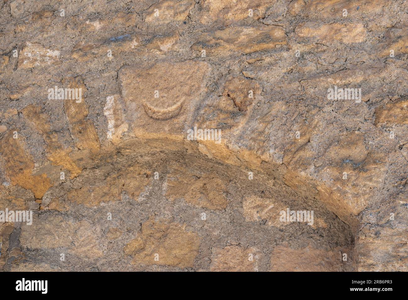 Nasrid Tower with half moon carving at Iglesia de la Villa Church former Montefrio Castle - Montefrio, Andalusia, Spain Stock Photo