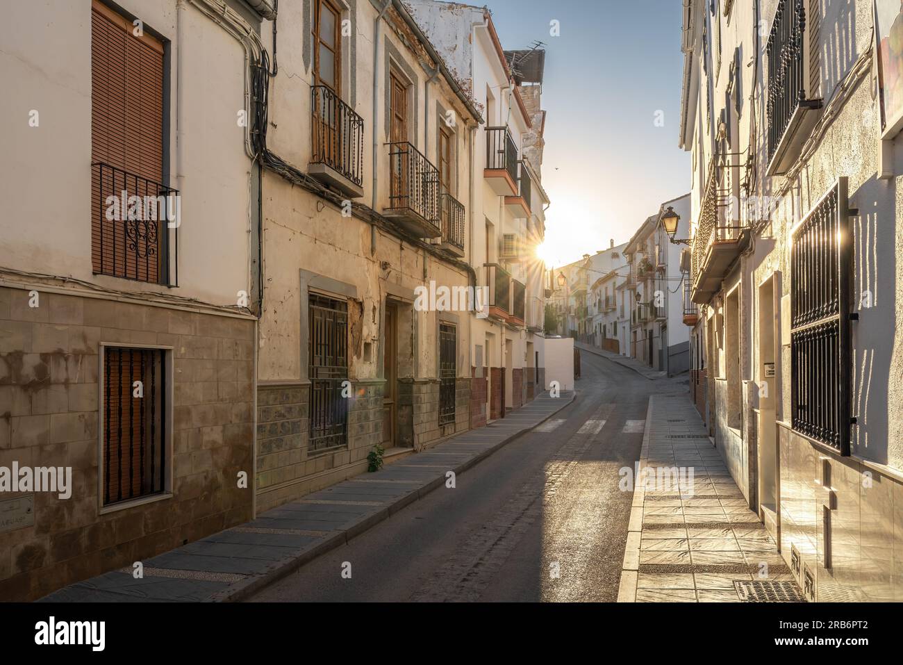 Montefrio Street at sunrise - Montefrio, Andalusia, Spain Stock Photo