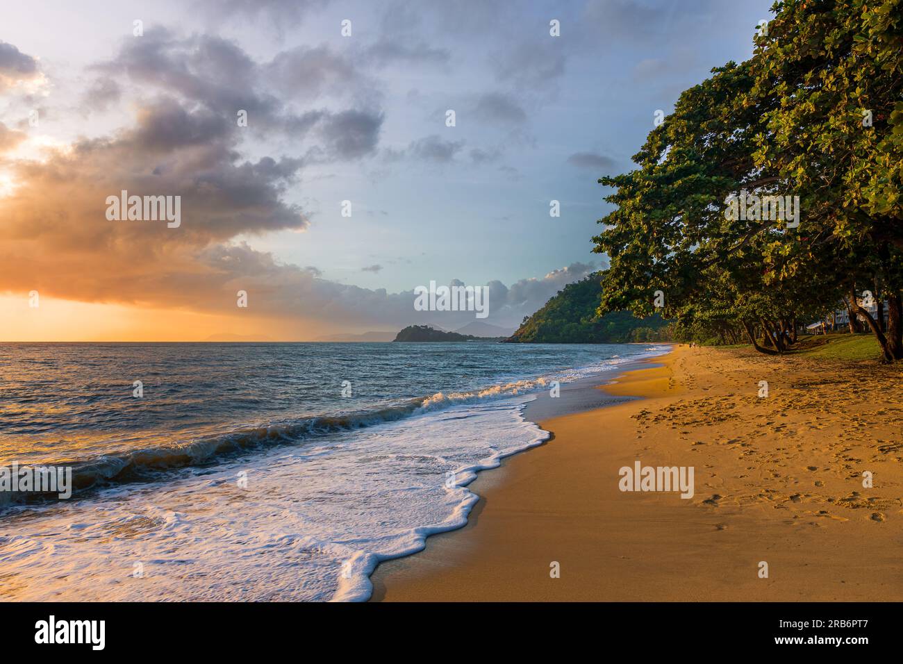 Idyllic beach at sunrise.  Trinity Beach. Cairns. Stock Photo