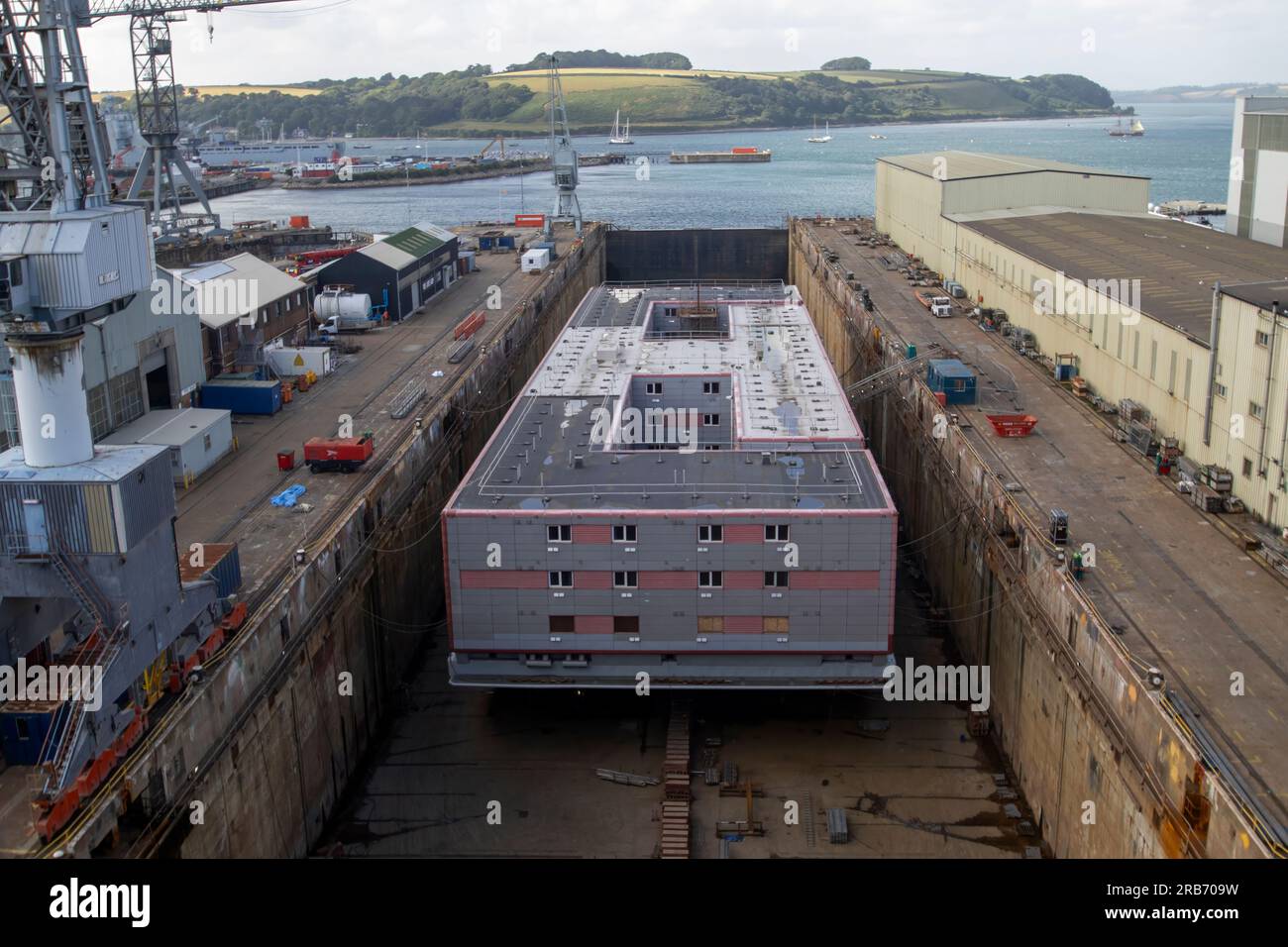 An accommodation barge being renovated in dry dock in Falmouth, Cornwall, UK Stock Photo