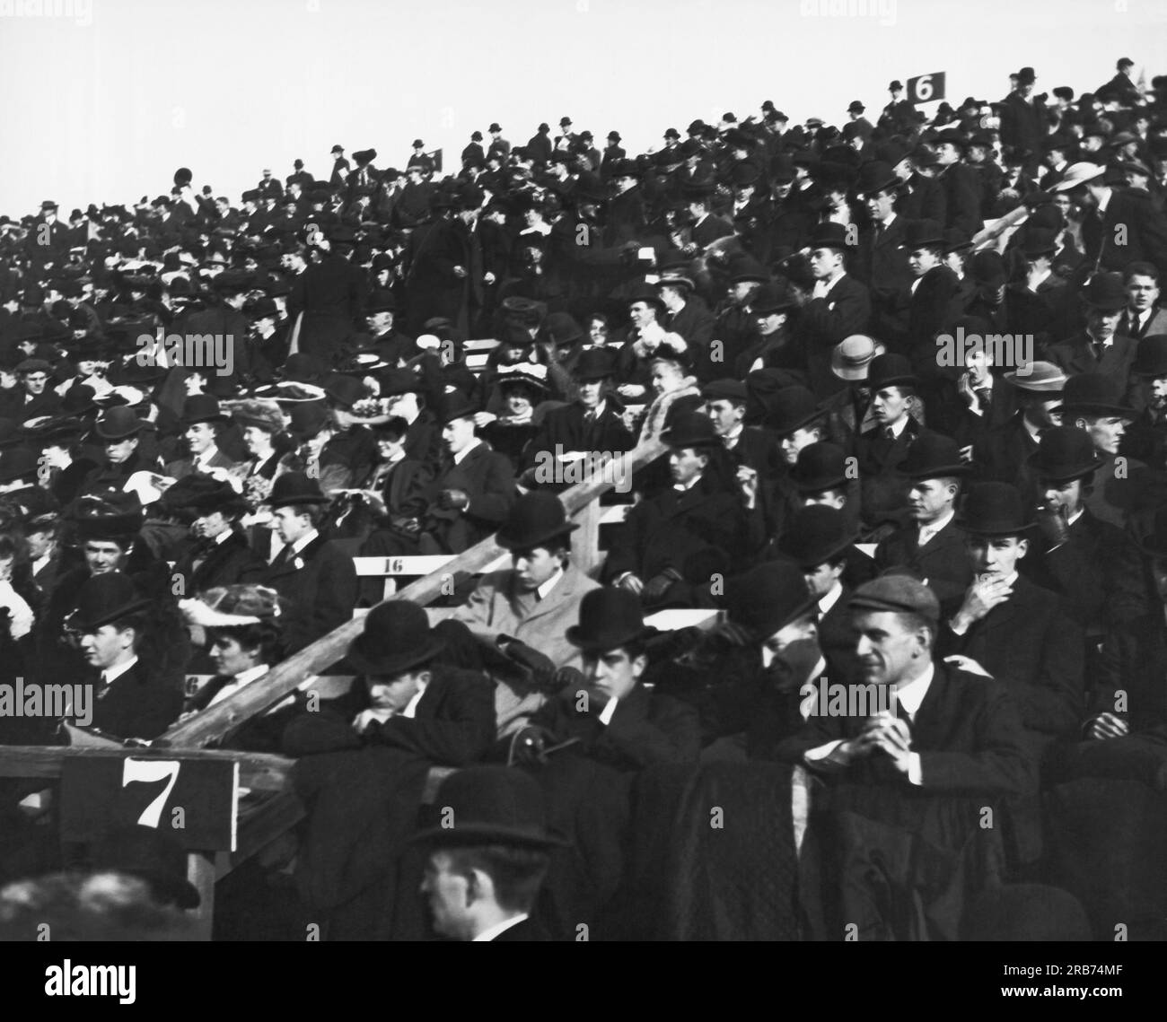 Boston, Massachusetts:  1905 Football fans attending the Harvard-Yale game at Harvard Stadium in Allston. Stock Photo