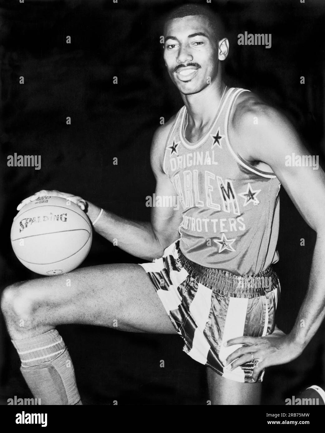 United States 1959 AllStar basketball player Wilt Chamberlain wearing