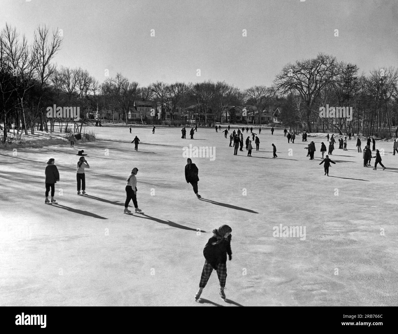 Madison, Wisconsin: c. 1952. Local residents enjoying ice skating on ...