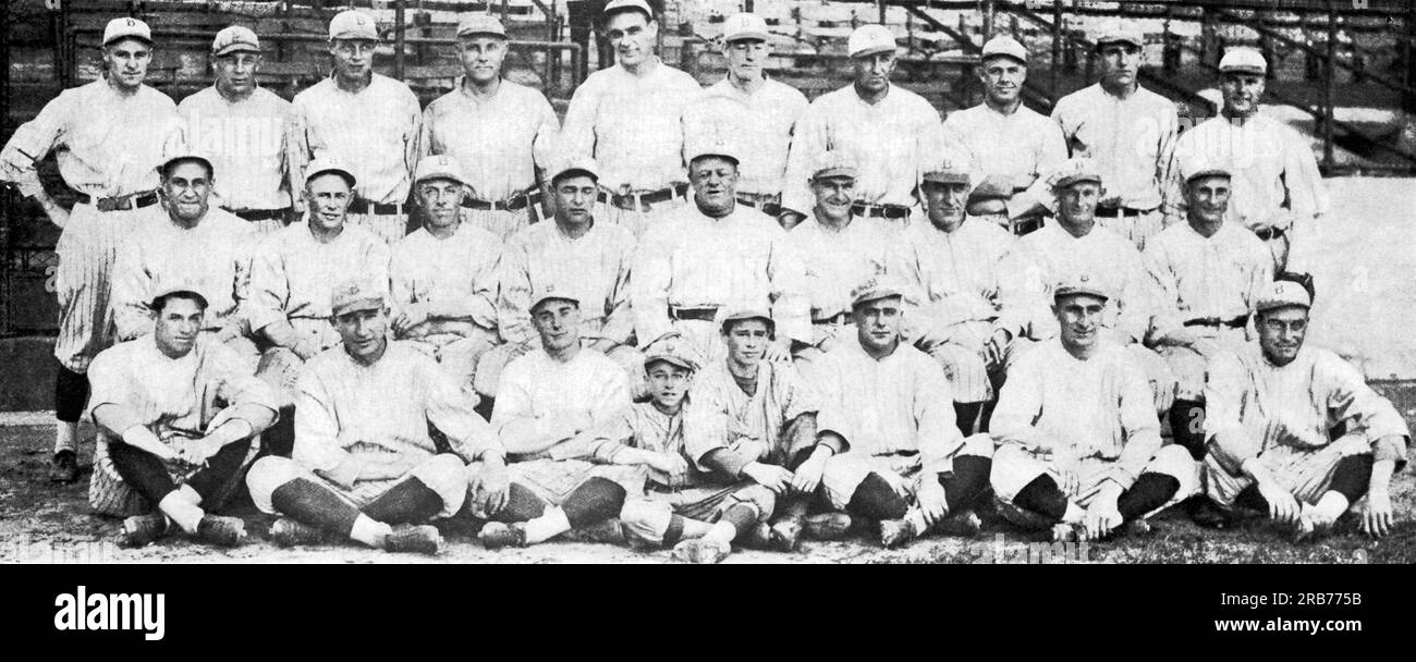 New York, New York:  1920 A team portrait of the 'Brooklyn's', the National League Champions in 1920. L-R, top row:  Sheridan, i.f.; Mohart, p.; Schmandt, i.f.; MIller, c.; Lamar, p.; Cadore, p.; Grimes, p.; Miljus, p.; Griffith, r.f.; L-R, Mid Row: Kruger, c.;  Kilduff, 2b, ; Johnston, 3b,; Wheat, l.f.; Robinson, Mgr.; Myers, c.f.; Konetchy, 1b.; Smith, p.; Olson, s.s.; L-R Bot Row: McCabe, i.f.; Taylor, c.; Neis, r.f.; Eddie Bennett, (bat boy); Cloude, (bat boy); Elliott, c.; Sheehan, l.f.; Mitchell,p. Stock Photo