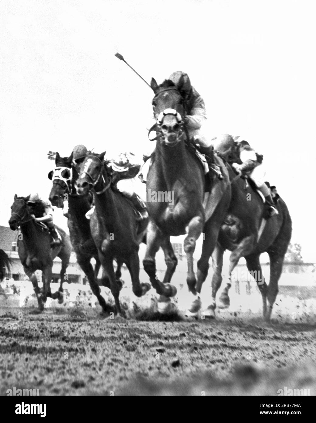 Spokane, Washington:  August 27, 1973 Revel Step with jockey Jerry Tokata hits the wire first in the second race at Playfair Commerce Park. Stock Photo