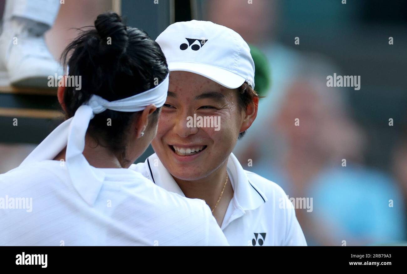 London, UK. 7th July, 2023. Bai Zhuoxuan (R) of China greets Ons Jabeur