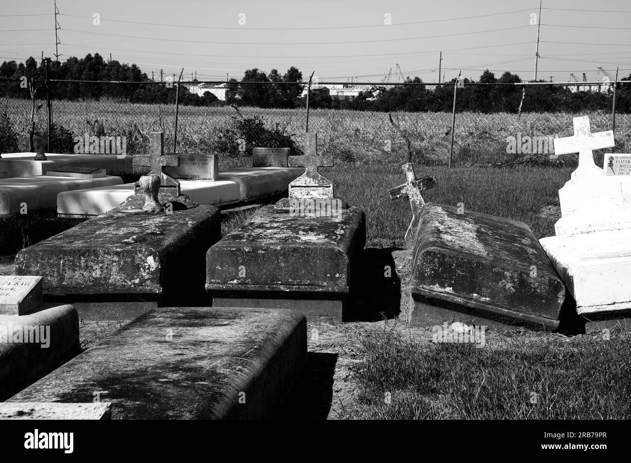 Coffin Crypts sinking in to ground Stock Photo Alamy