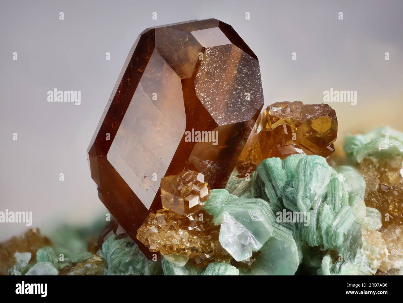 Grossular (Var: Hessonite) - Laietto, Condove, Metropolitan City of Turin, Piedmont, Italy 4.42 mm Hessonite crystal. Stock Photo