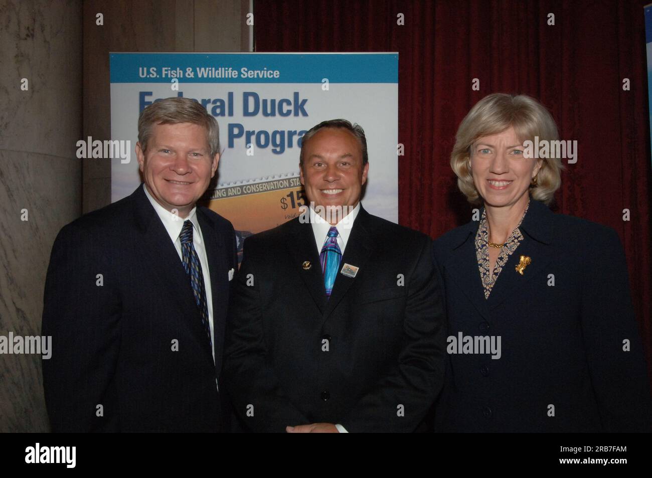 Federal Duck Stamp first day sale program at the Russell Senate Office Building on Capitol Hill, with Secretary Gale Norton, South Dakota Senators Tim Johnson and John Thune, Arkansas Senator Blanche Lincoln, South Dakota Congresswoman Stephanie Herseth, Fish and Wildlife Service Acting Director Matt Hogan, and Washington, D.C. Postmaster Delores Killette joined by 2004 Duck Stamp Contest winning artist Mark Anderson and 2005 Junior Duck Stamp Contest winning artist Kerissa Nelson, among other attendees Stock Photo