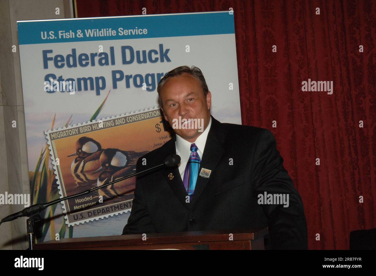 Federal Duck Stamp first day sale program at the Russell Senate Office Building on Capitol Hill, with Secretary Gale Norton, South Dakota Senators Tim Johnson and John Thune, Arkansas Senator Blanche Lincoln, South Dakota Congresswoman Stephanie Herseth, Fish and Wildlife Service Acting Director Matt Hogan, and Washington, D.C. Postmaster Delores Killette joined by 2004 Duck Stamp Contest winning artist Mark Anderson and 2005 Junior Duck Stamp Contest winning artist Kerissa Nelson, among other attendees Stock Photo