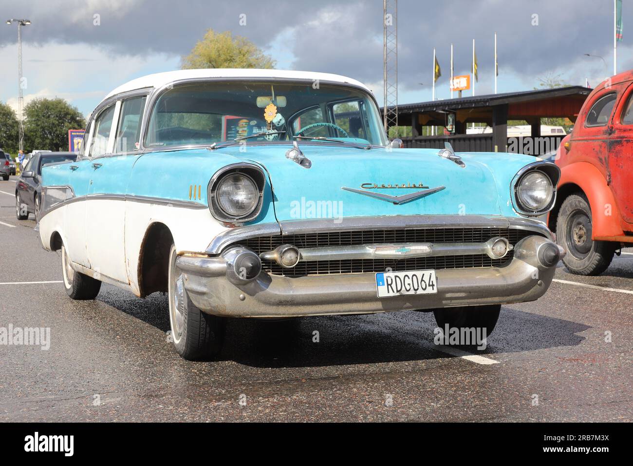 Vasteras, Sweden - July 7, 2023: Front view of a parked 1957 4-door Chevrolet 210 sedan in two-tone paint. Stock Photo
