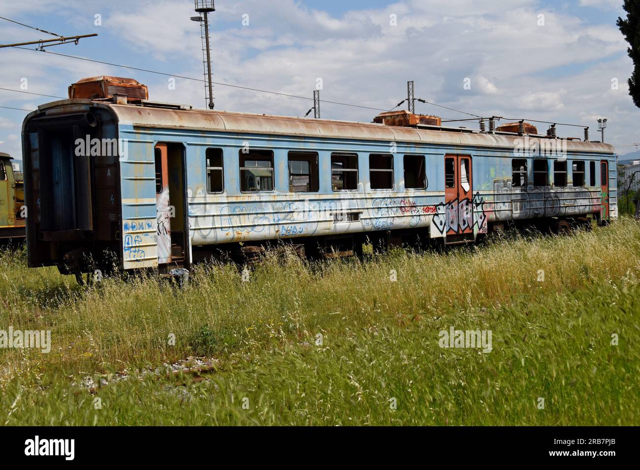 Derelict and disused railway carriages in the depot at Podgorica Railway Station, Montenmegro Stock Photo