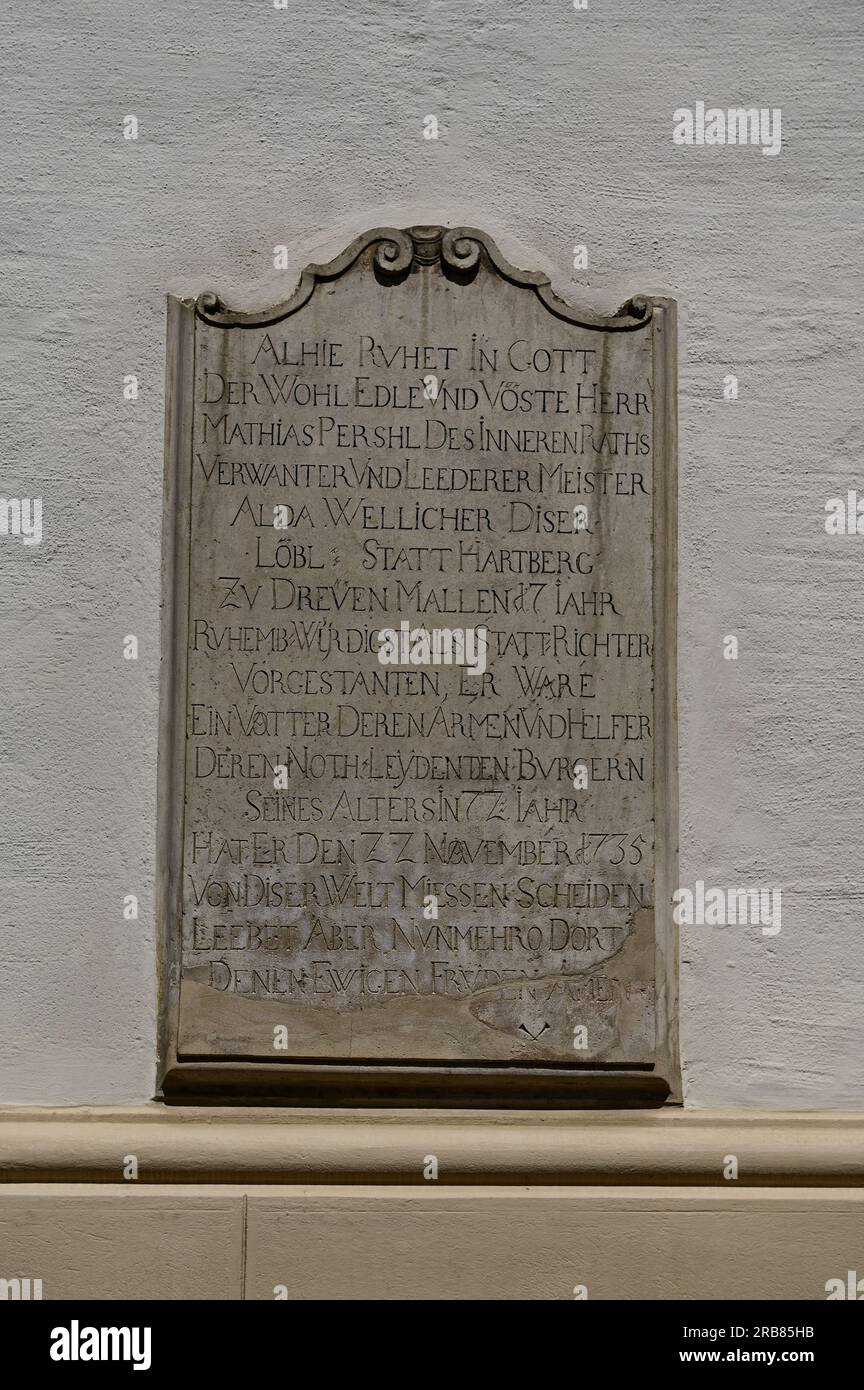 Hartberg, Styria, Austria. June 29, 2023. City Parish church of St. Martin in Hartberg. Stone plaque on the outer wall of the parish church Stock Photo