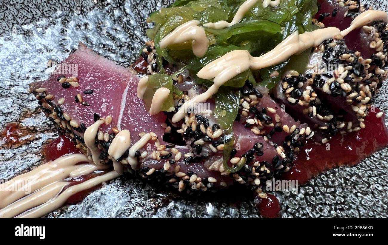 red tuna tataki served in a restaurant Stock Photo