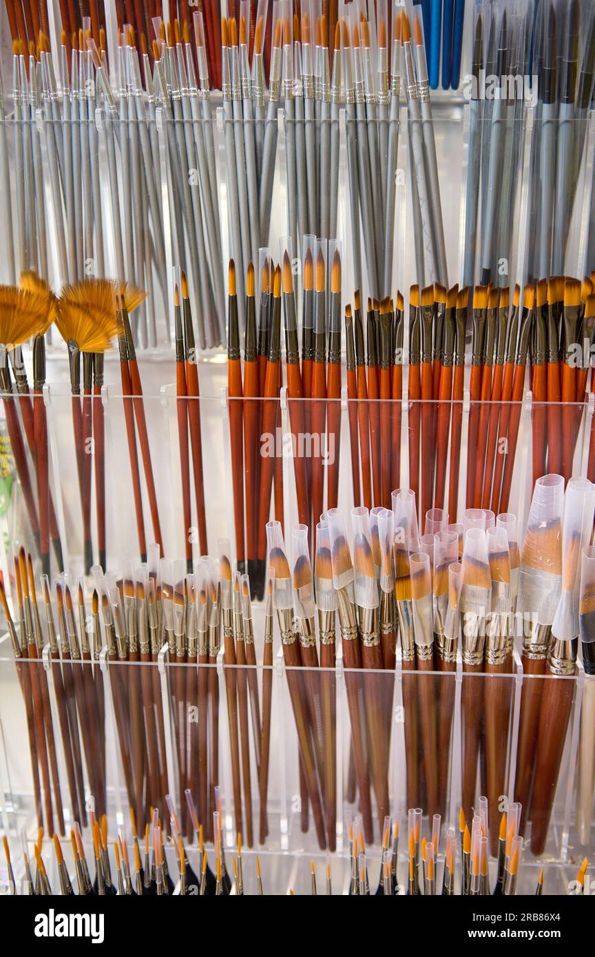 Group of new artistic paintbrushes on shelf display for sale in art ...
