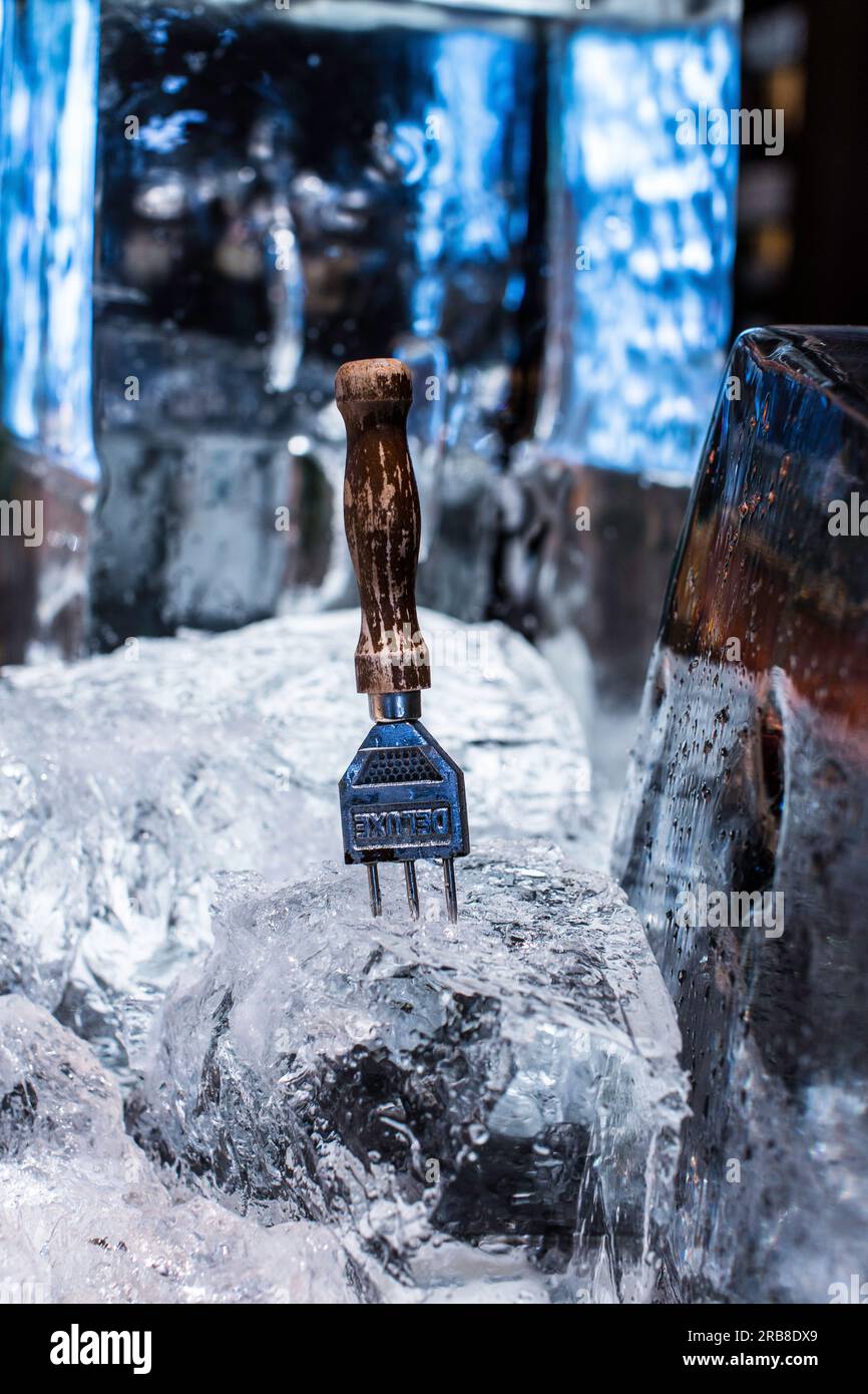 ice with an ice picker with wooden handle at the Zuma bar restaurant in Dubai united Arab Emirates Stock Photo