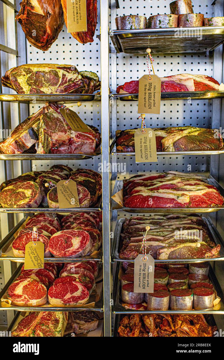 Dry aging meat refrigerator. Stock Photo