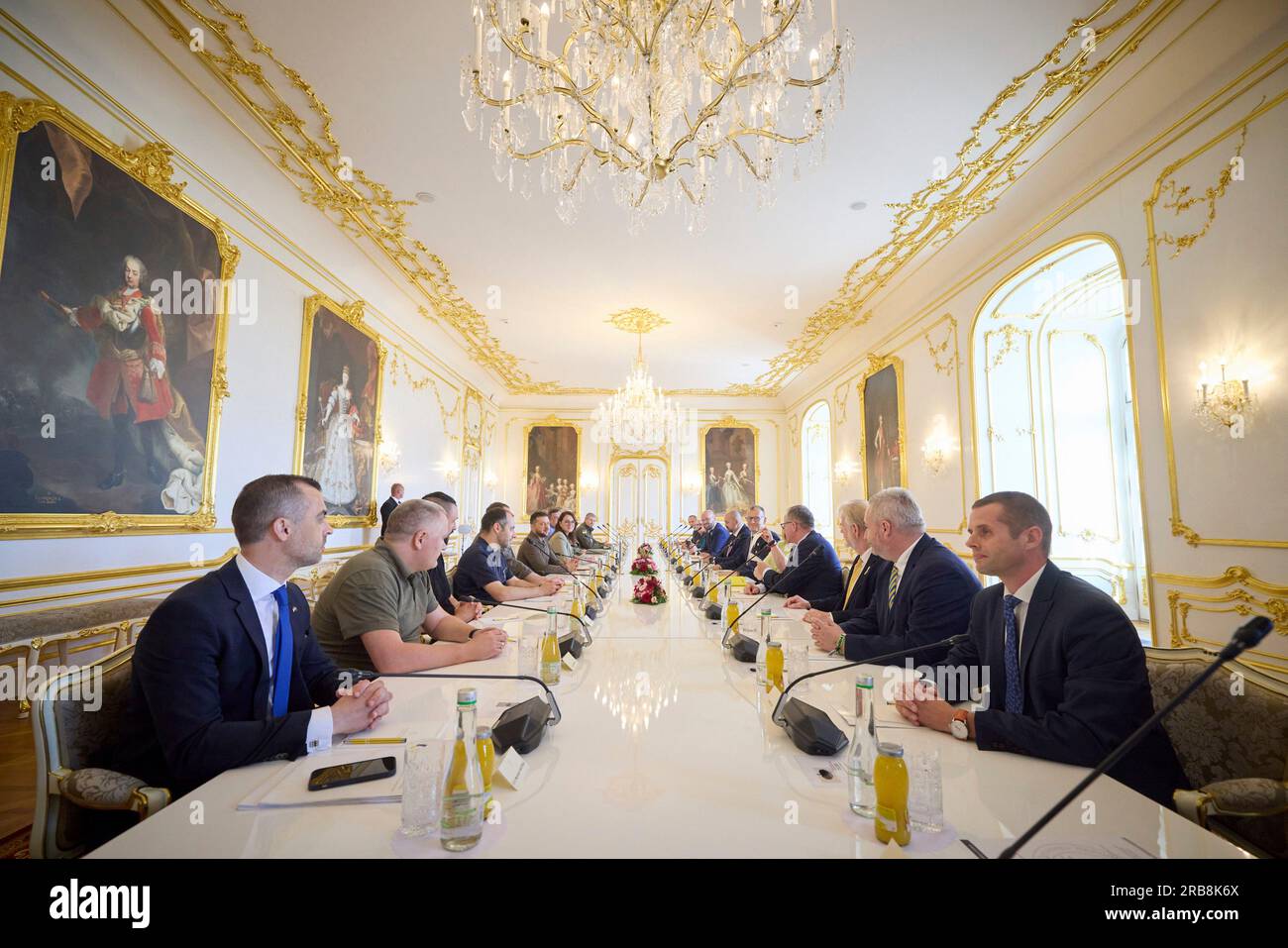 Bratislava, Slovakia. 07th July, 2023. Slovak National Council chair Borys Kollar and Slovak parliamentarians, right, before the start of an expanded bilateral meeting with Ukrainian President Volodymyr Zelenskyy, left center, and delegation at the Grassalkovich palace, July 7, 2023 in Bratislava, Slovakia. Credit: Ukraine Presidency/Ukraine Presidency/Alamy Live News Stock Photo