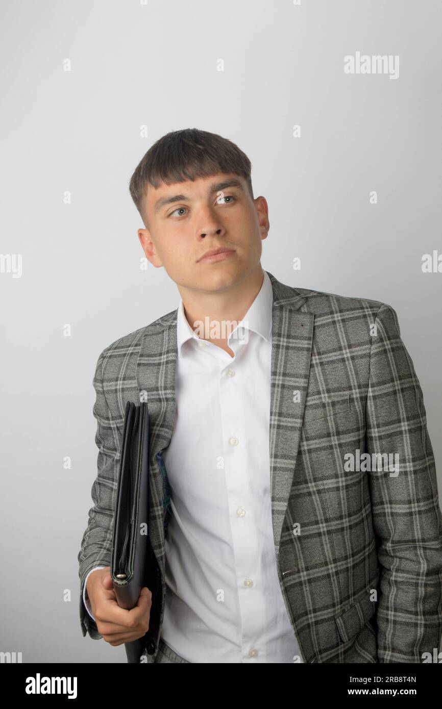 Young entrepreneur wearing a suit jacket and open neck shirt without a